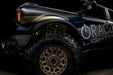 Low shot of fiber optic wheel liner kit installed with yellow LED lighting.