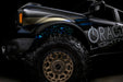 Low shot of fiber optic wheel liner kit installed with cyan LED lighting.