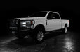 Three quarters view of a white Ford SuperDuty with LED Off-Road Side Mirrors installed.