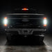 Straight rear view of black Ford F-150 with Flush Style LED Tail Lights installed and reverse lights on