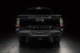 Straight rear view of black Toyota Tacoma with Flush Style LED Tail Lights installed and running lights on