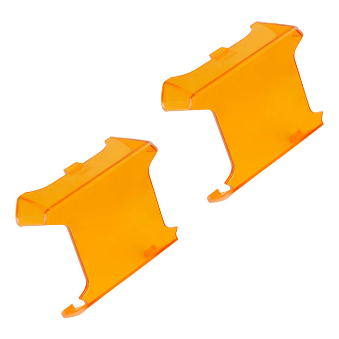 Angled view of amber VEGA Series Lens Covers
