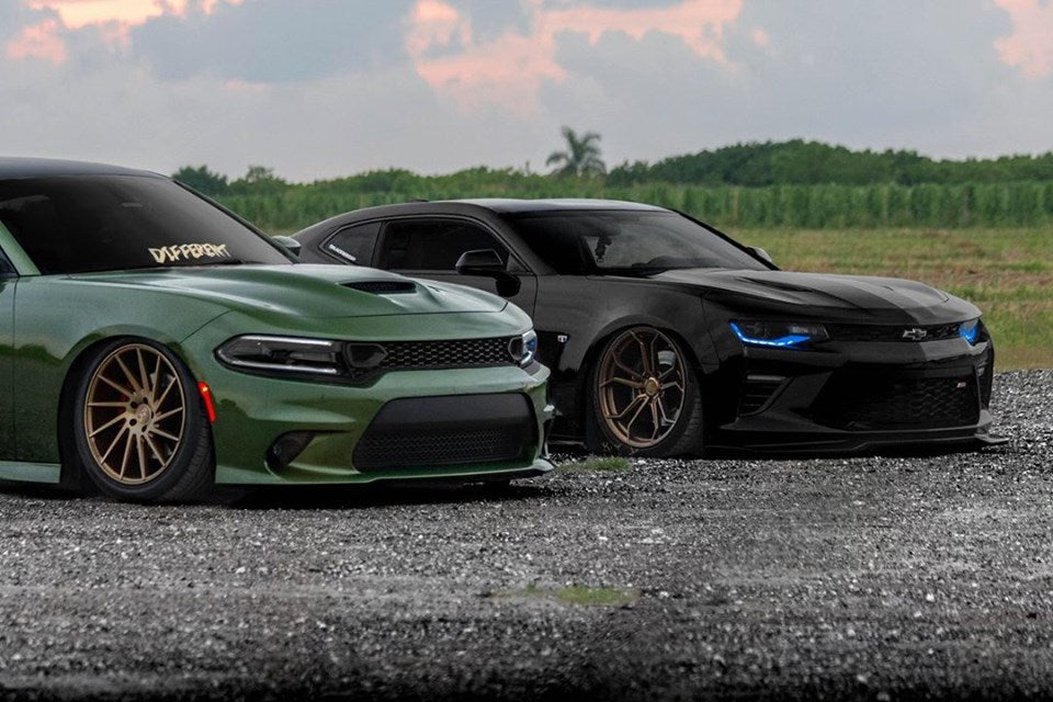 Black Camaro with blue DRLs.