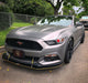 Three quarters view of a Ford Mustang with red demon eye projector headlights.