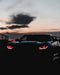 Chevrolet Camaro with red projector halos.