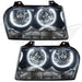 Chrysler 300 headlights with white LED halo rings.