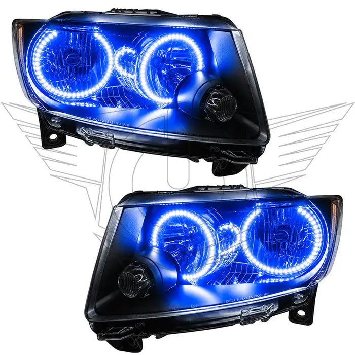 Jeep Grand Cherokee headlights with blue LED halo rings.