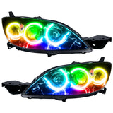 Mazda 3 headlights with ColorSHIFT LED halo rings.