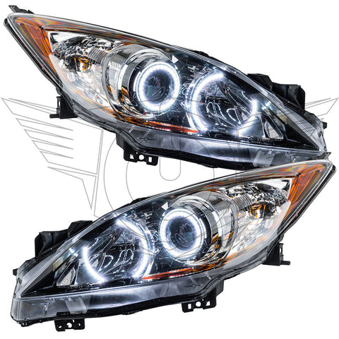 Mazda 3 headlights with white LED halo rings.