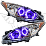 Mazda 3 headlights with purple LED halo rings.