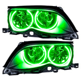 BMW 3 Series headlights with green LED halo rings.