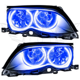 BMW 3 Series headlights with blue LED halo rings.