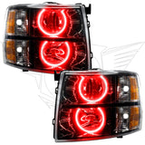 Chevrolet Silverado headlights with black housing and red LED halo rings.