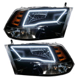 RAM 1500 Sport headlights with white halos.