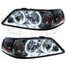 Lincoln Town Car headlights with white LED halo rings.