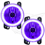 Jeep Wrangler JK fog lights with purple LED halo rings.