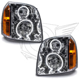 GMC Yukon headlights with white LED halo rings.