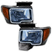 Ford F-150 headlights with white LED halo rings.