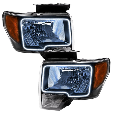 Ford F-150 headlights with white LED halo rings.