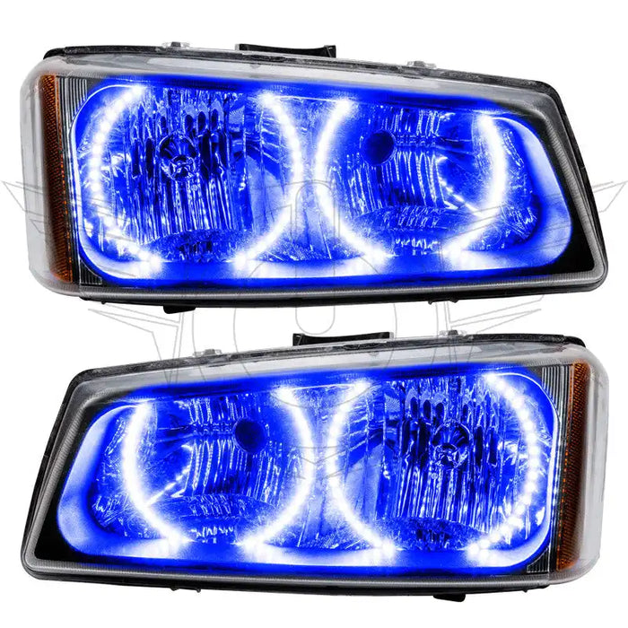 Chevrolet Silverado headlights with blue LED halo rings.