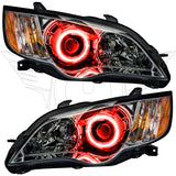 Subaru Legacy headlights with red halos.