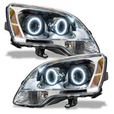 GMC Acadia headlights with white LED halo rings.