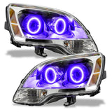 GMC Acadia headlights with purple LED halo rings.