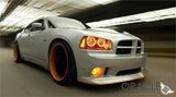 White charger rolling with amber halos.