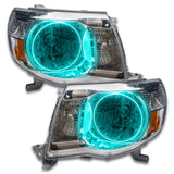 2005-2011 Toyota Tacoma Pre-Assembled Halo Headlights with aqua LED halo rings.