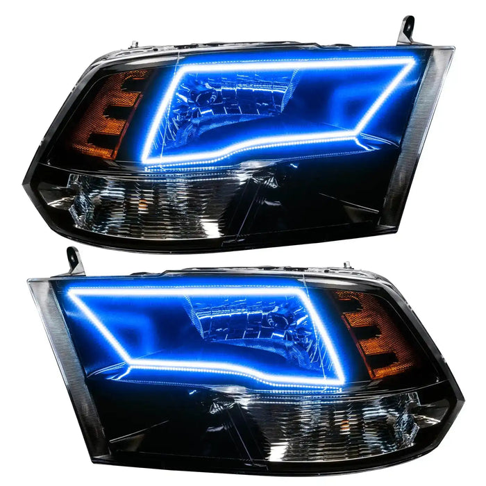 2009-2018 RAM ColorSHIFT Switchback Quad Pre-Assembled Halo Headlights - Black Housing with blue halos.