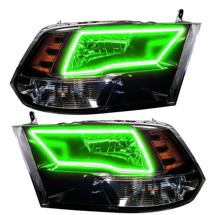 2009-2018 RAM ColorSHIFT Switchback Quad Pre-Assembled Halo Headlights - Black Housing with green halos.