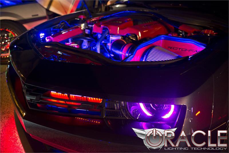 Camaro with blue engine bay lighting.