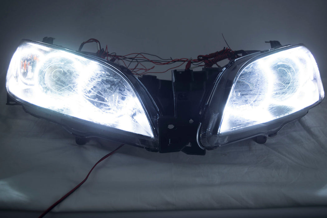 2004-2009 Mazda 3 4 Door Projector Headlights - ORACLE WHITE LED Halos