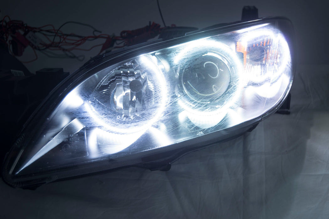 2004-2009 Mazda 3 4 Door Projector Headlights - ORACLE WHITE LED Halos