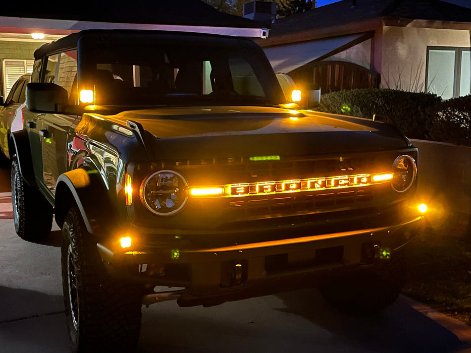 Ford Bronco with amber orange LED letter badges installed