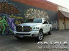 Three quarters view of a Dodge Ram with white LED headlight halo rings installed.