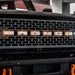 Close-up on the grill of a Ford Bronco with Amber LED Illuminated Letter Badges installed.