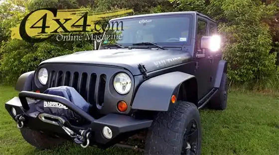 Three quarters view of a Jeep Wrangler JK with LED Off-Road Side Mirrors installed.