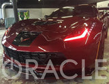 Front end of a Chevrolet C7 Corvette with red headlight DRLs.
