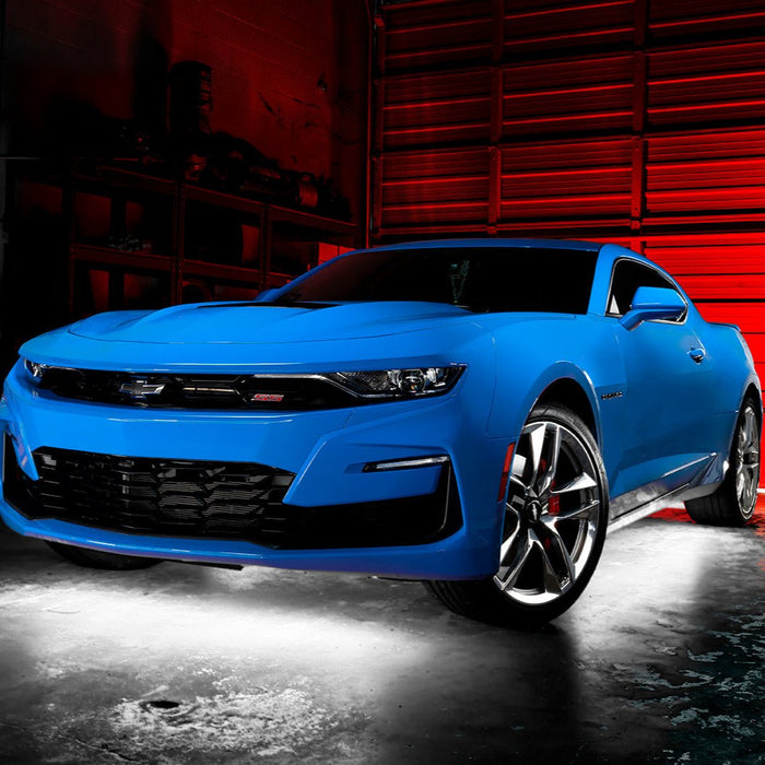 Blue Camaro with white LED underglow.