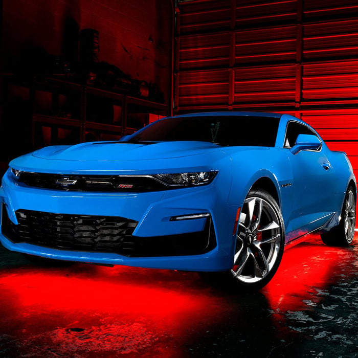 Blue Camaro with red LED underglow.