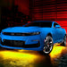 Blue Camaro with yellow LED underglow.