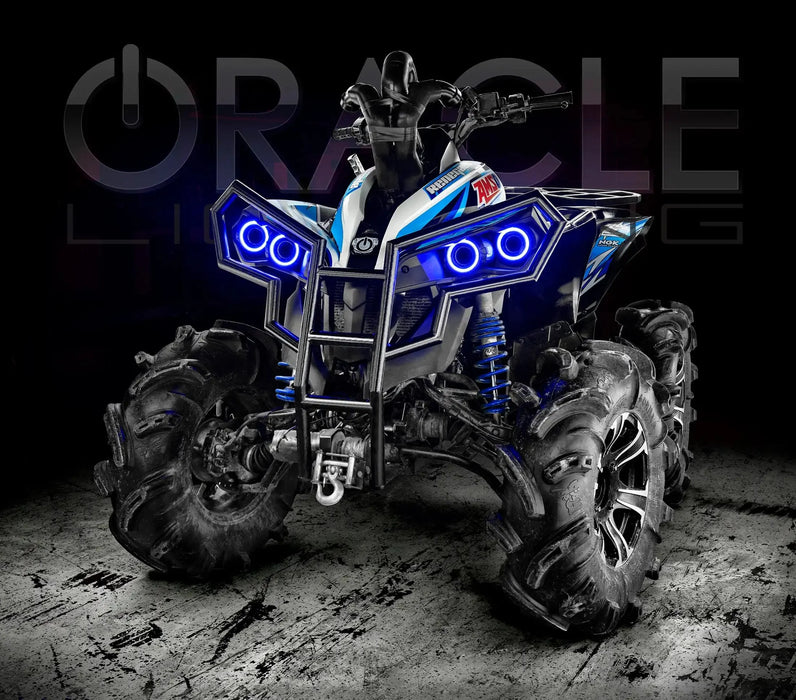 Can-Am Renegade with blue LED Surface Mount Headlight Halos installed.