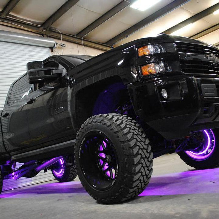 Black truck with purple LED wheel rings.