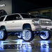 Silver Chevrolet with white wheel rings.