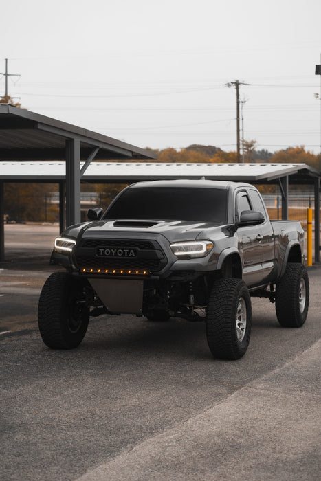 Three quarters view of a truck with a RFT lightbar installed on the grill