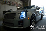 Three quarters view of a Cadillac CTS with white LED headlight halo rings.