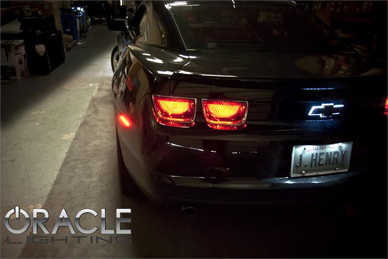 Rear end of a Chevrolet Camaro with Illuminated LED Rear Bowtie Emblem installed.