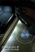 GOBO Projector installed on a car door, projecting the BMW logo.