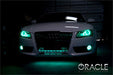 Front end of an Audi A5 with aqua LED headlight and fog light halo rings installed.